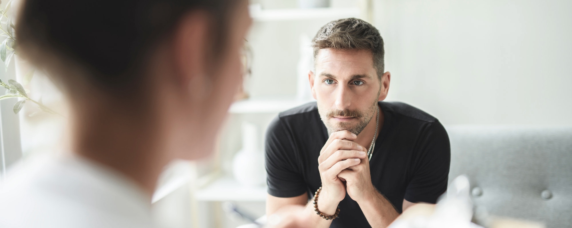 young man in anxiety treatment at safe harbor