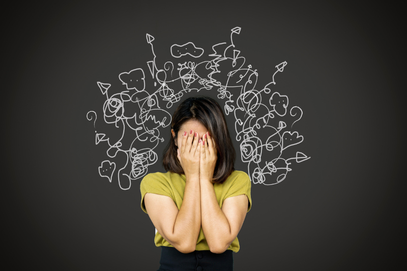 A woman experiencing a panic attack or an anxiety attack.